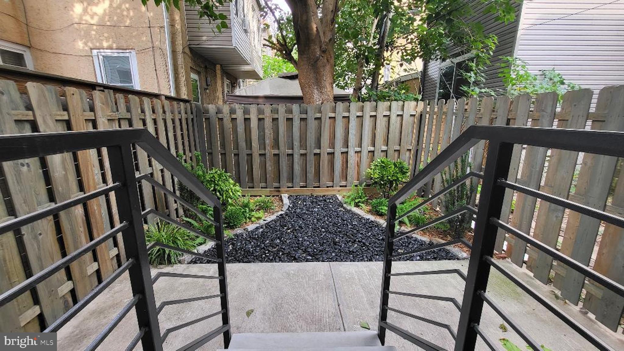 1237 South 27th Street Philadelphia, PA 19146 - Photo 35 of 36 a view of a porch with a bench