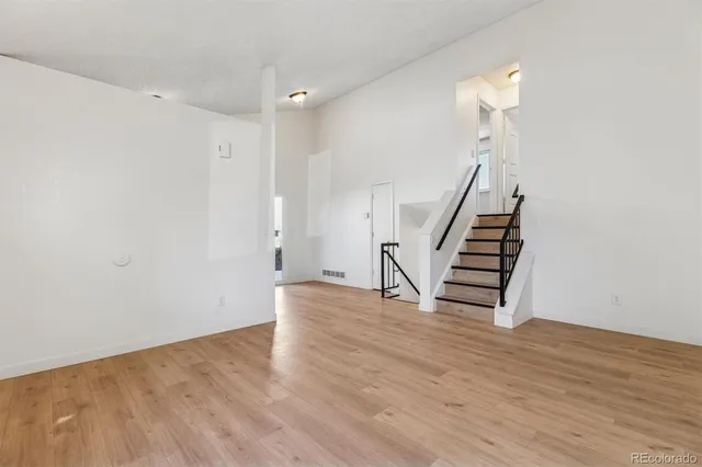 a view of entryway with wooden floor