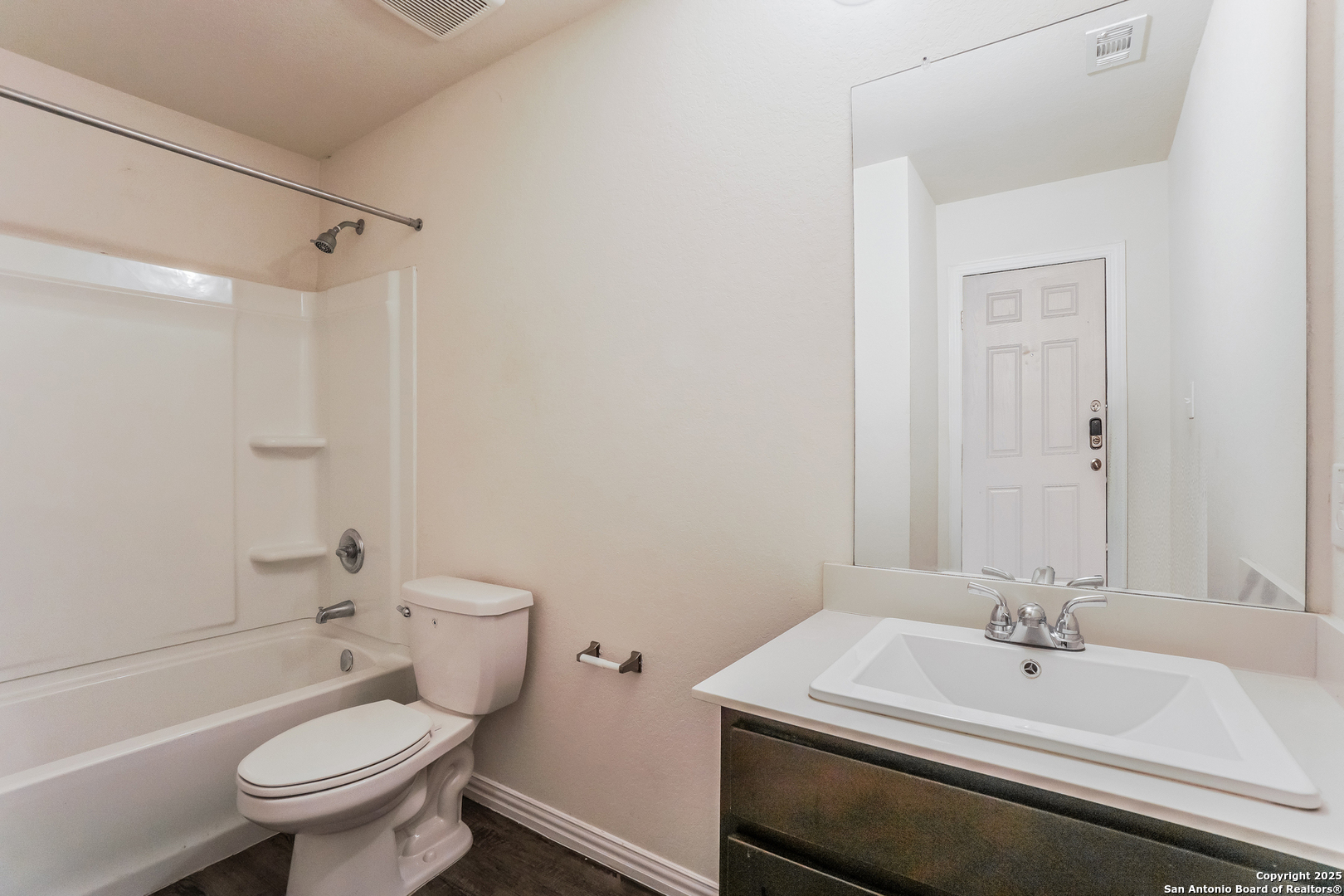 527 Elley Street Seguin, TX 78155 - Photo 12 of 21 a bathroom with a sink a toilet and shower