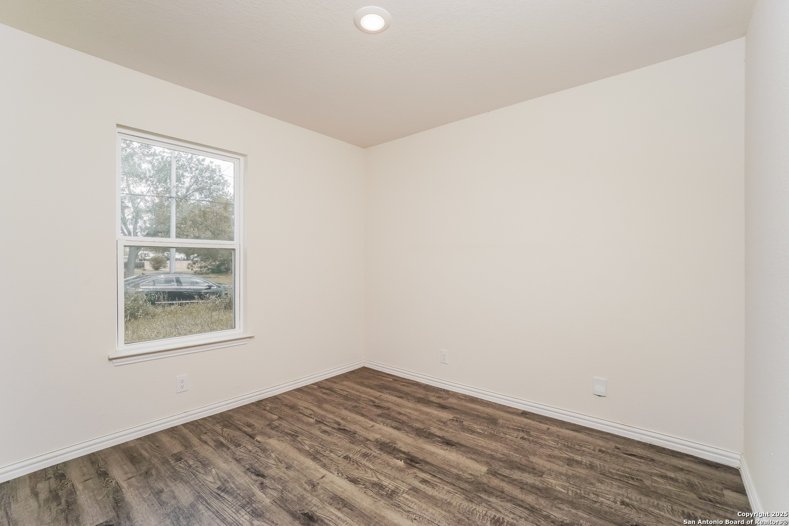 527 Elley Street Seguin, TX 78155 - Photo 14 of 21 an empty room with a window
