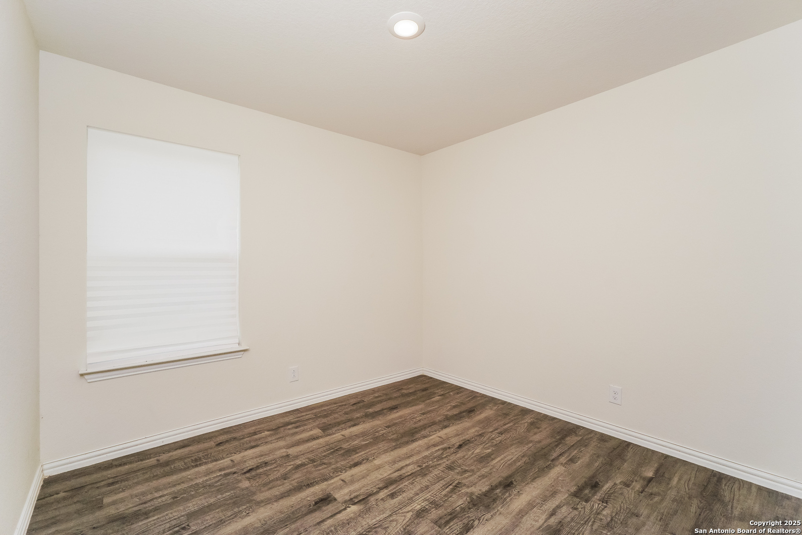527 Elley Street Seguin, TX 78155 - Photo 15 of 21 a view of empty room with wooden floor