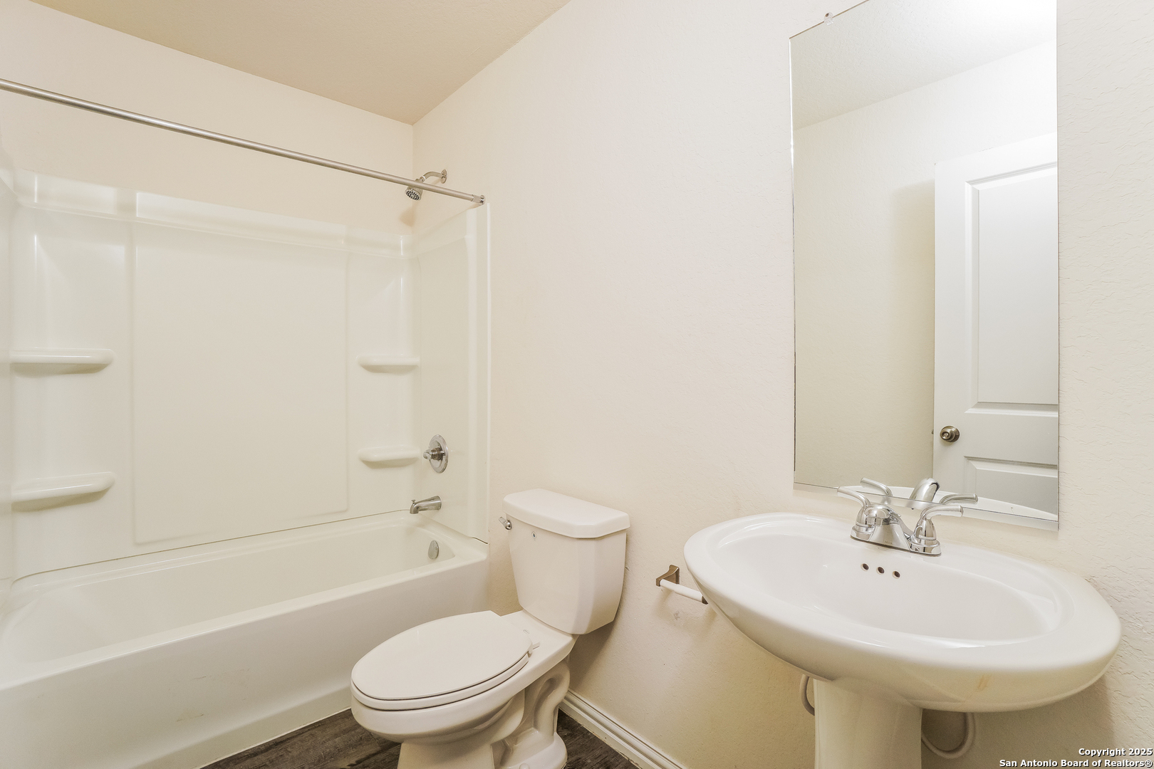 527 Elley Street Seguin, TX 78155 - Photo 16 of 21 a bathroom with a sink toilet and shower