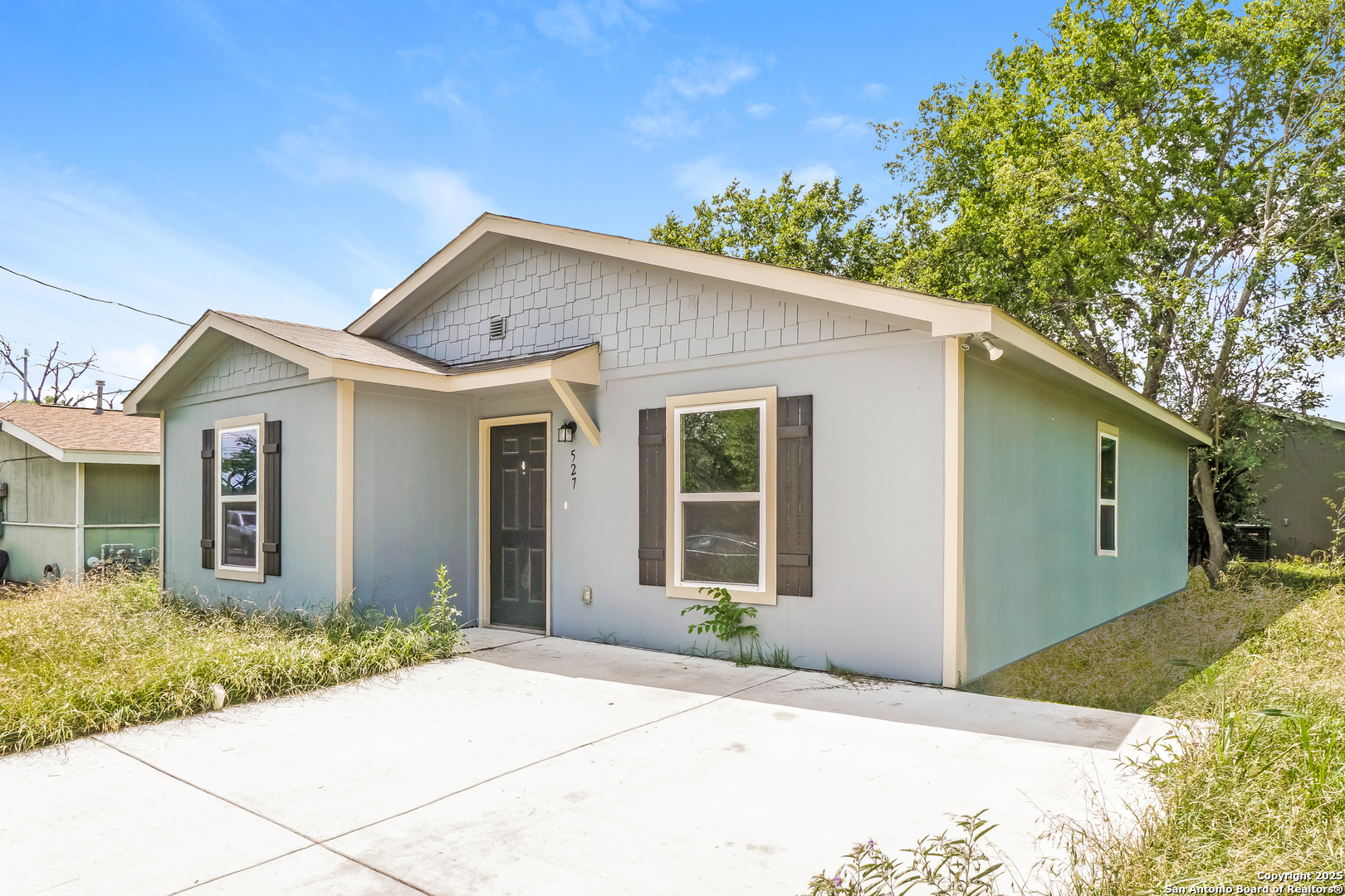 527 Elley Street Seguin, TX 78155 - Photo 2 of 21 a front view of house with yard and trees around