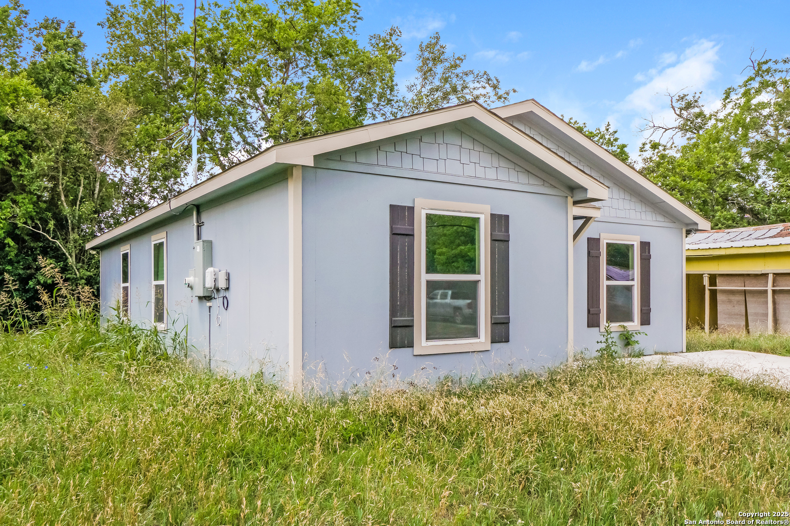 527 Elley Street Seguin, TX 78155 - Photo 3 of 21 front view of house with a yard