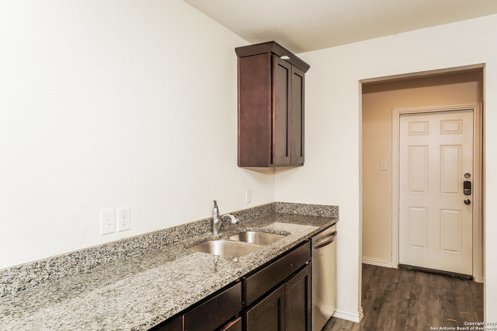 527 Elley Street Seguin, TX 78155 - Photo 7 of 21 a bathroom with a granite countertop sink and a mirror