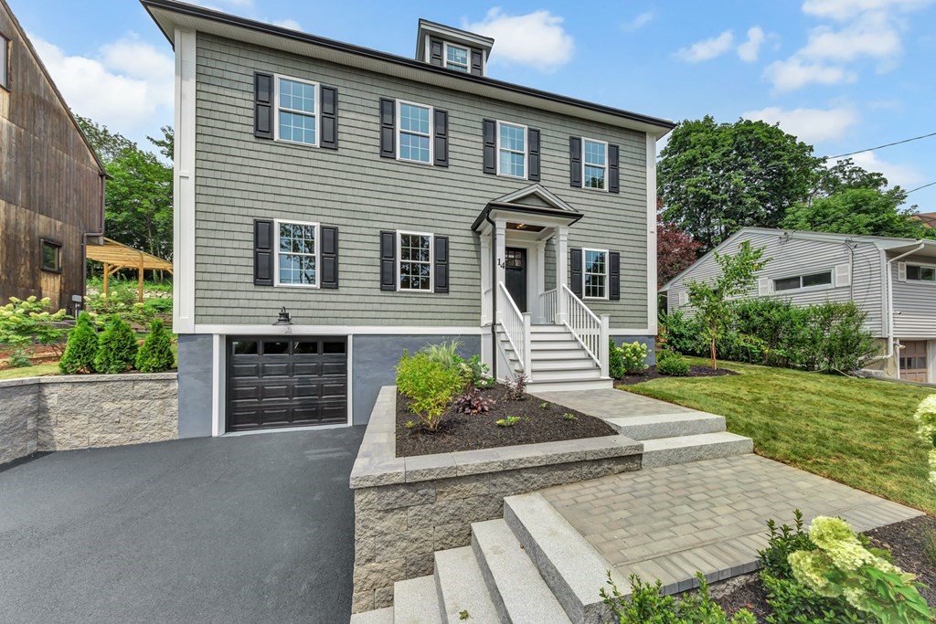 14 Yerxa Road Arlington, MA 02474 - Photo 1 of 42 front view of a house with a yard