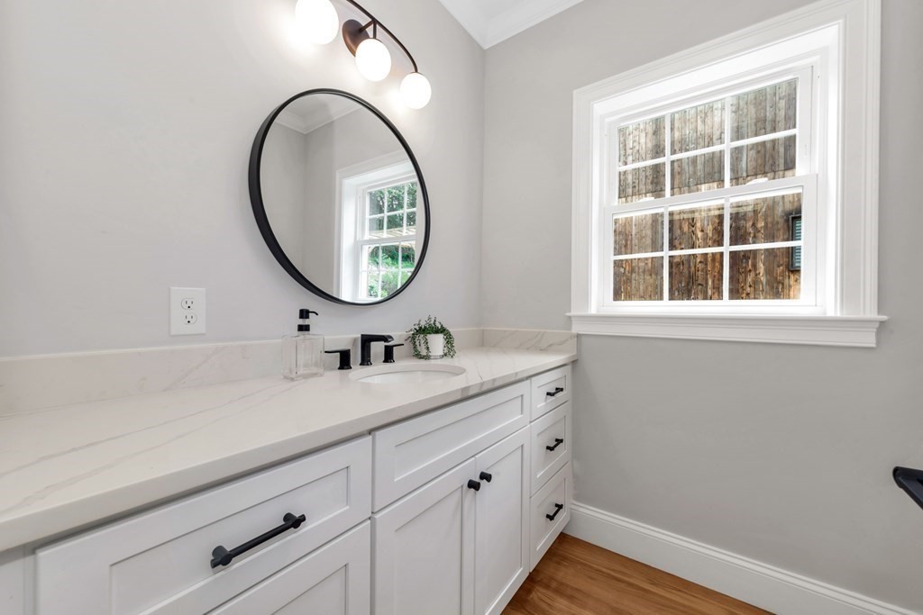 14 Yerxa Road Arlington, MA 02474 - Photo 17 of 42 a bathroom with a sink and a mirror