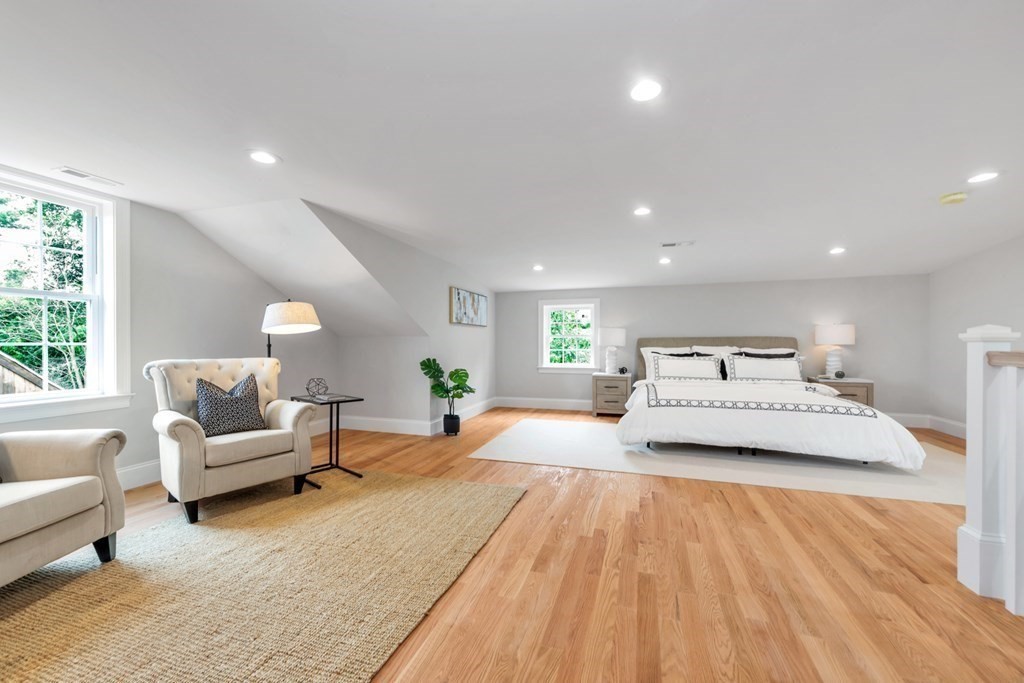 14 Yerxa Road Arlington, MA 02474 - Photo 18 of 42 a bedroom with a large bed and a couch