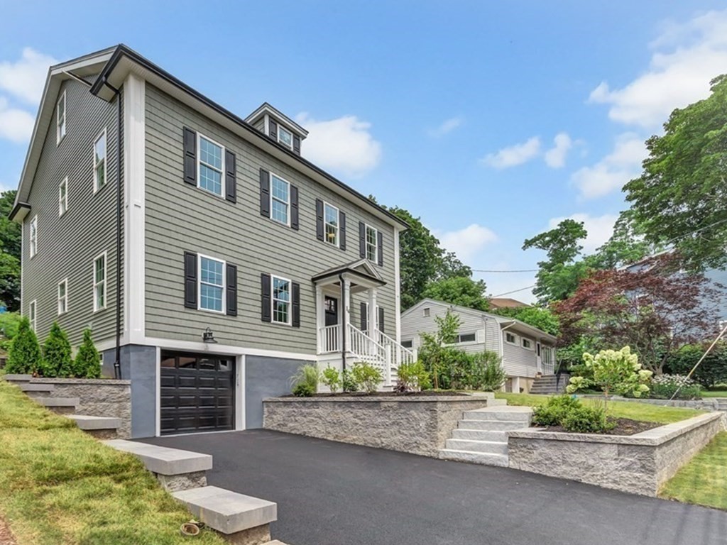 14 Yerxa Road Arlington, MA 02474 - Photo 2 of 42 a front view of a house with garden