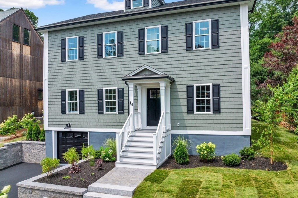 14 Yerxa Road Arlington, MA 02474 - Photo 40 of 42 a front view of a house with plants