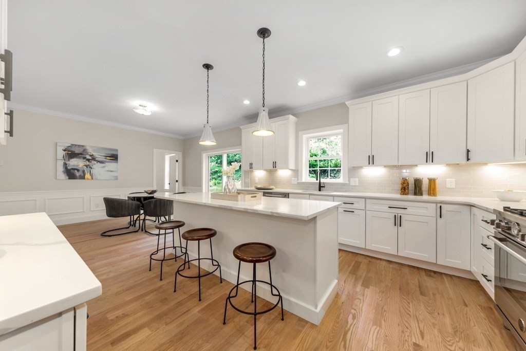 14 Yerxa Road Arlington, MA 02474 - Photo 9 of 42 a kitchen with sink cabinets and wooden floor