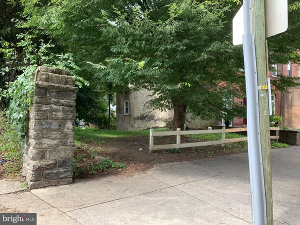 a view of backyard with green space