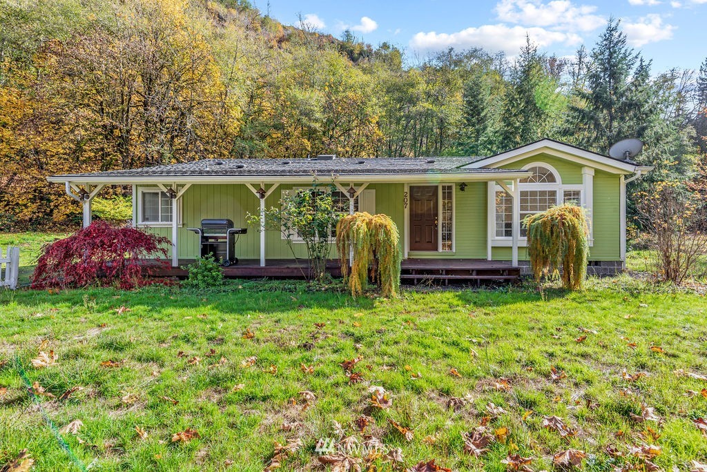 207 Apple Creek Road Longview, WA 98632 - Photo 1 of 33 a view of a house with backyard