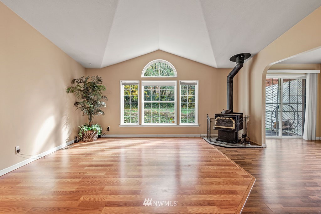 207 Apple Creek Road Longview, WA 98632 - Photo 2 of 33 a view of a livingroom with wooden floor and a large window