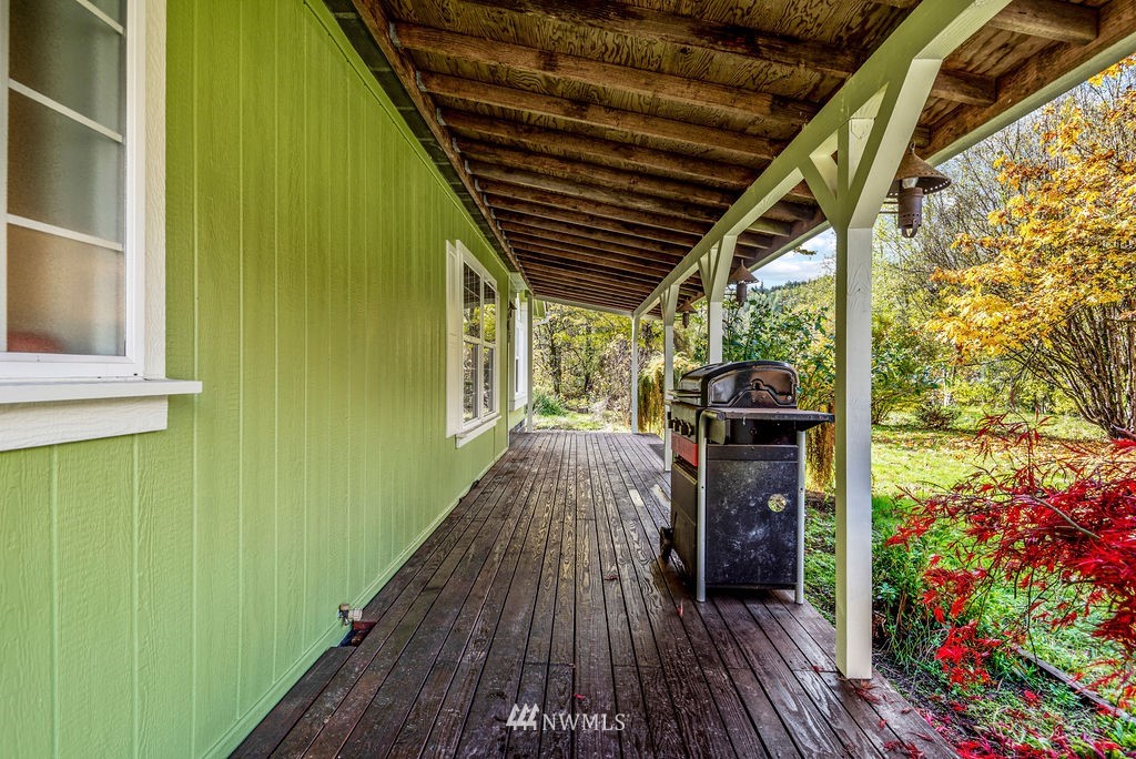 207 Apple Creek Road Longview, WA 98632 - Photo 22 of 33 a view of a porch with wooden floor