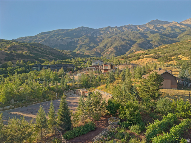 1801 Fort Canyon Road Alpine, UT 84004 - Photo 17 of 26 Mountainous terrain with natural vegetation, featuring multiple residential structures and paved pathways
