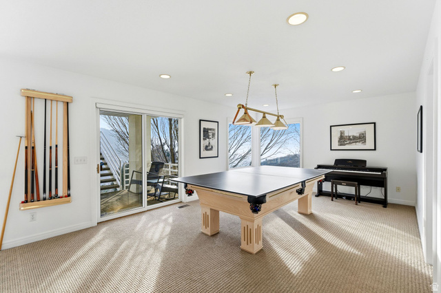 1878 East Ridge Point Drive Bountiful, UT 84010 - Photo 30 of 92 Recreation room with plenty of natural light, recessed lighting, and light carpet