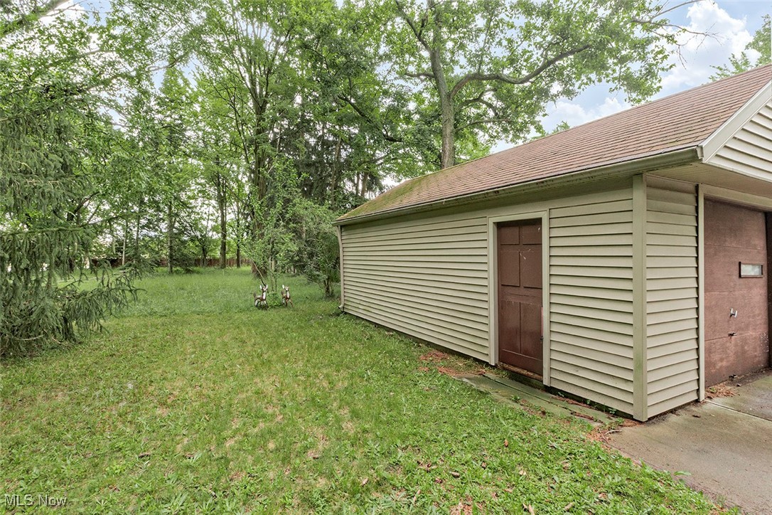 899 Lander Road Cleveland, OH 44143 - Photo 3 of 33 man door on garage