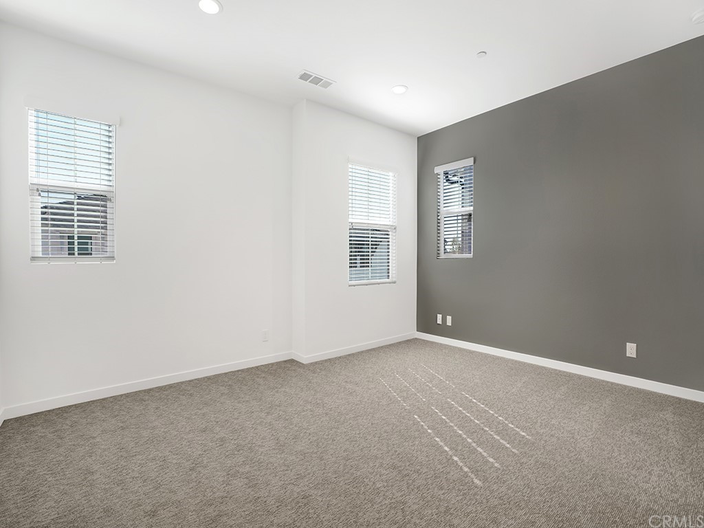 524 Caleigh Lane Costa Mesa, CA 92627 - Photo 12 of 19 a view of an empty room with a window