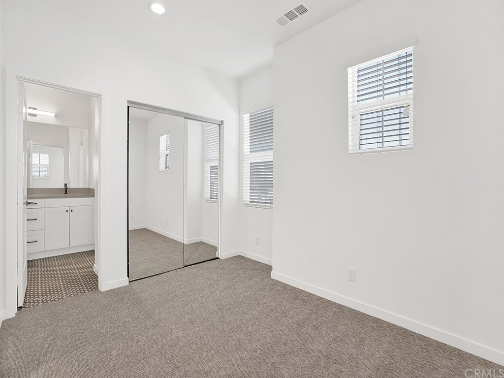 524 Caleigh Lane Costa Mesa, CA 92627 - Photo 19 of 19 an empty room with windows