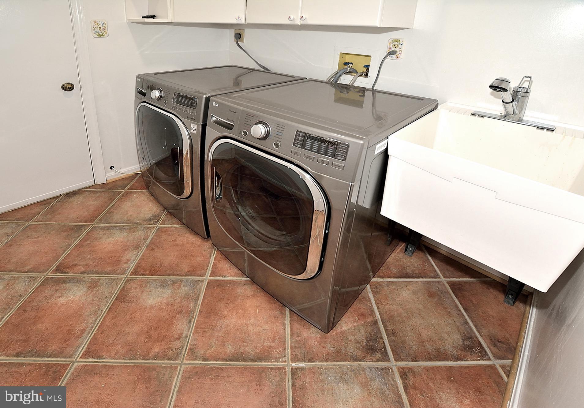 11093 Robert Carter Road Fairfax Station, VA 22039 - Photo 24 of 30 a utility room with dryer and washer