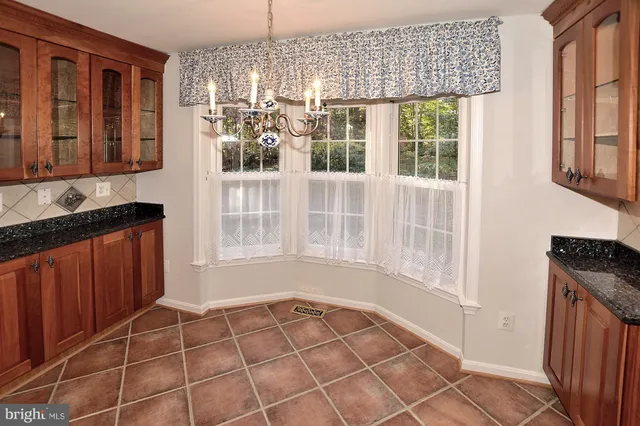 a view of empty room with windows