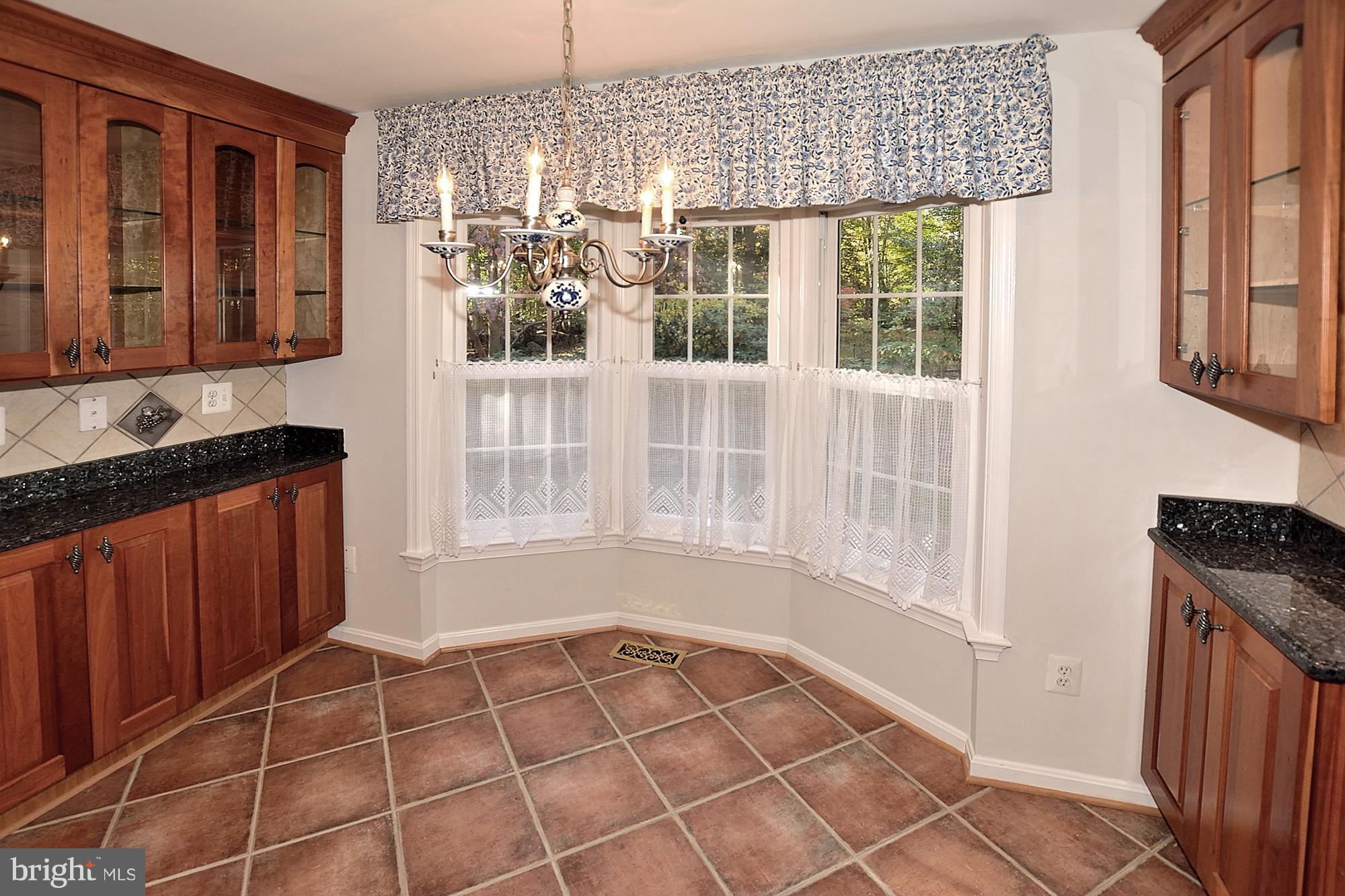 11093 Robert Carter Road Fairfax Station, VA 22039 - Photo 8 of 30 a view of empty room with windows