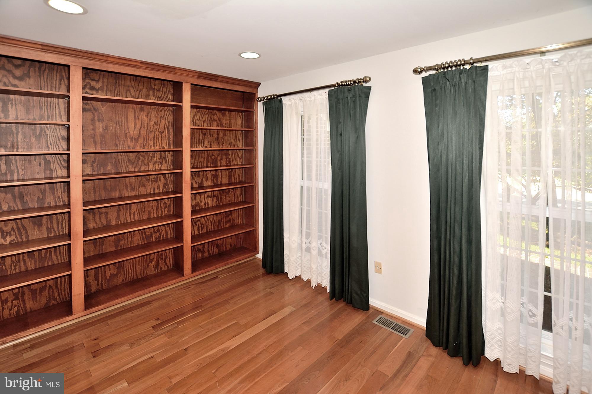 11093 Robert Carter Road Fairfax Station, VA 22039 - Photo 10 of 30 a view of empty room with wooden floor and closet