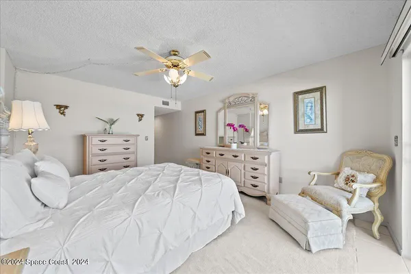a bedroom with a bed and furniture