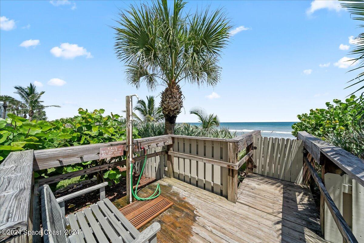2725 North Hwy A1A, Unit 403 Indialantic, FL 32903 - Photo 27 of 37 a view of balcony with wooden floor and outdoor seating