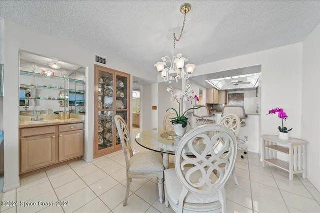a very nice looking dining room with a table and chairs