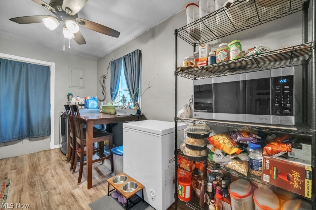 4875 Marigold Road Mentor, OH 44060 - Photo 17 of 27 Laundry room featuring light wood-style floors and ceiling fan