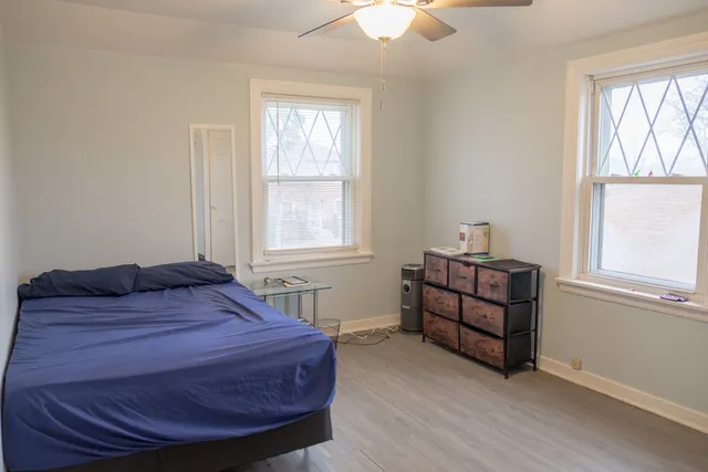 a room with a bed and a window