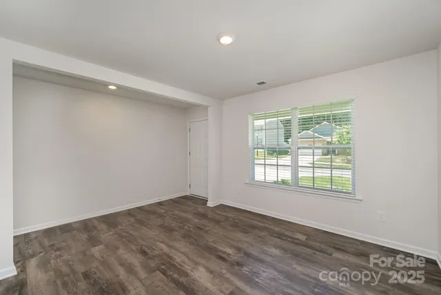 a view of a room that has a window in it