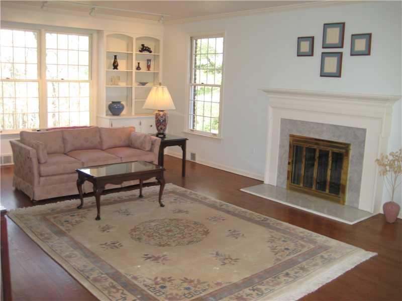 316 Wildberry Road Fox Chapel, PA 15238 - Photo 4 of 20 Living Room. Spectacular room with fireplace, built in bookshelves accent this beautiful sunken living room.