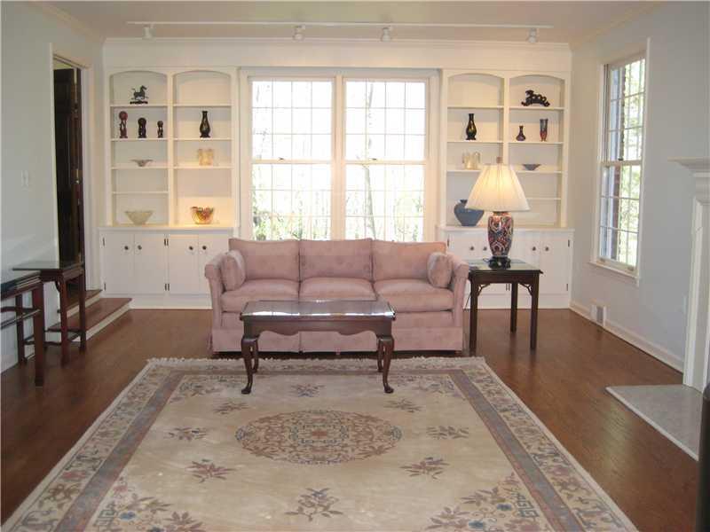 316 Wildberry Road Fox Chapel, PA 15238 - Photo 5 of 20 Living Room. View of room with bookshelves, gleaming hardwood floors and plenty of windows for natural light.