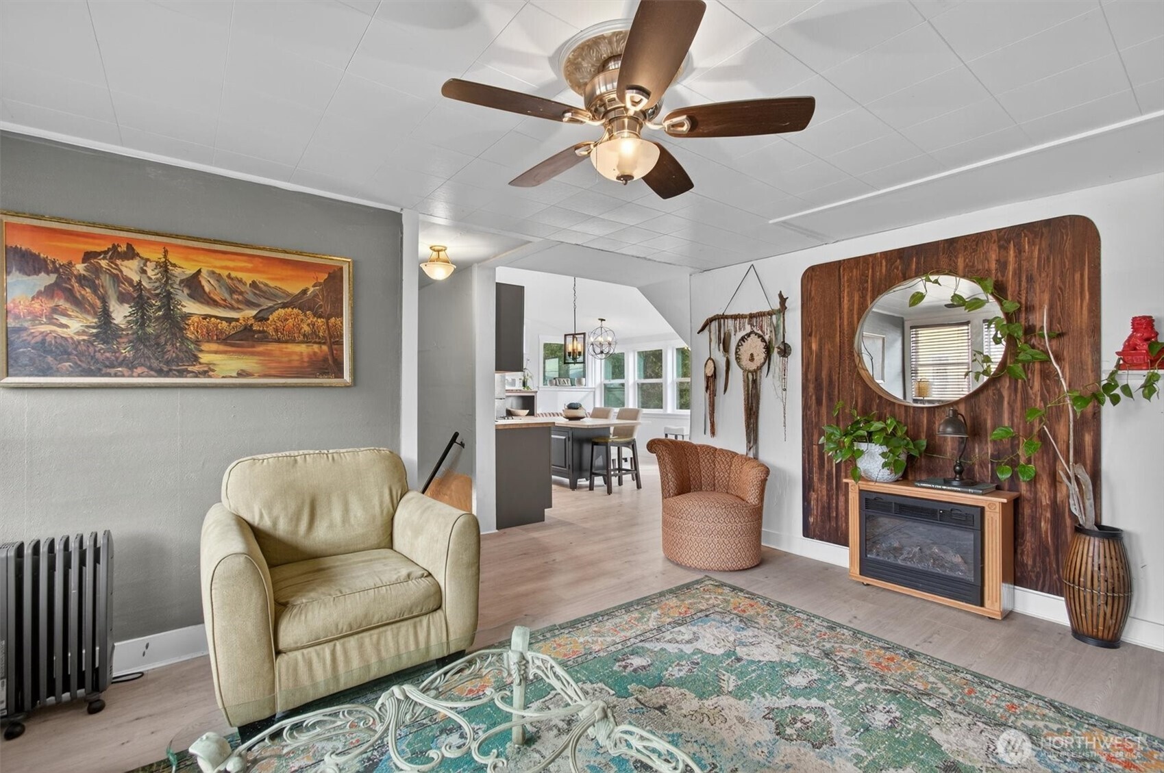 8 Fairgrounds Road Skamokawa, WA 98647 - Photo 23 of 40 a living room with furniture a rug and a large window