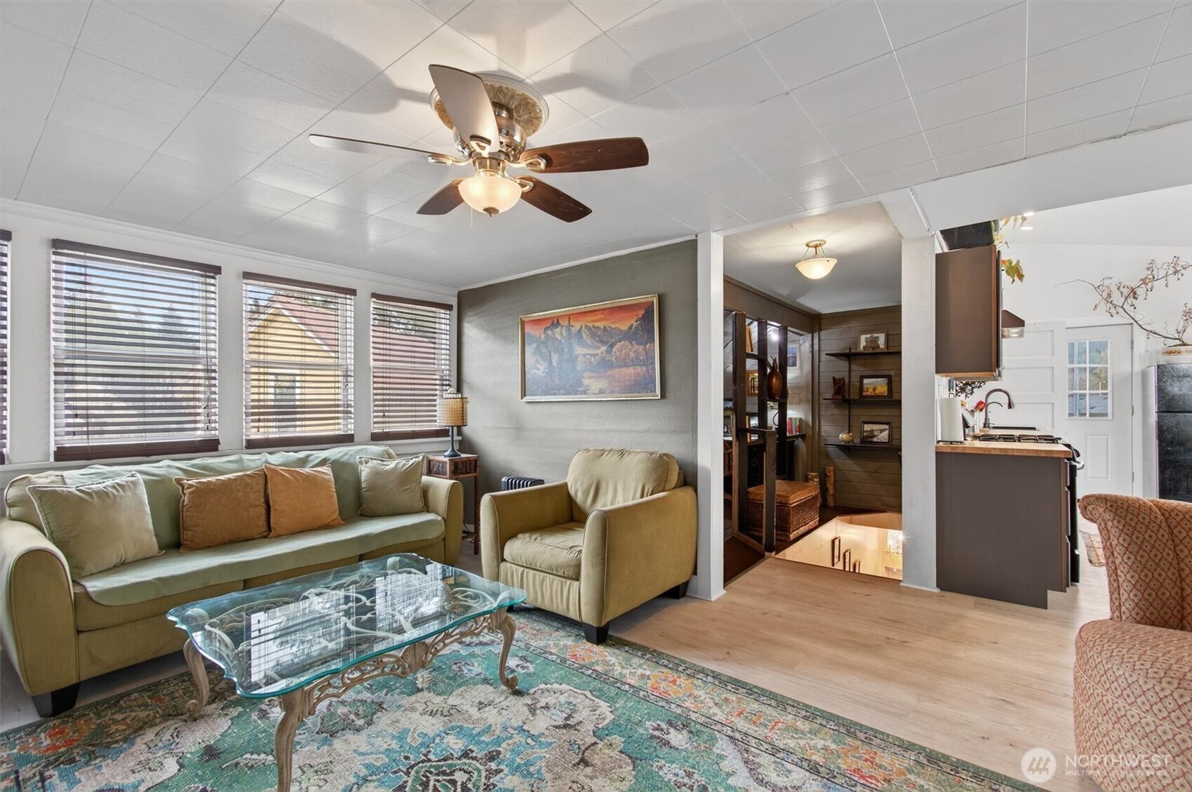 8 Fairgrounds Road Skamokawa, WA 98647 - Photo 33 of 40 a living room with furniture wooden floor and a large window