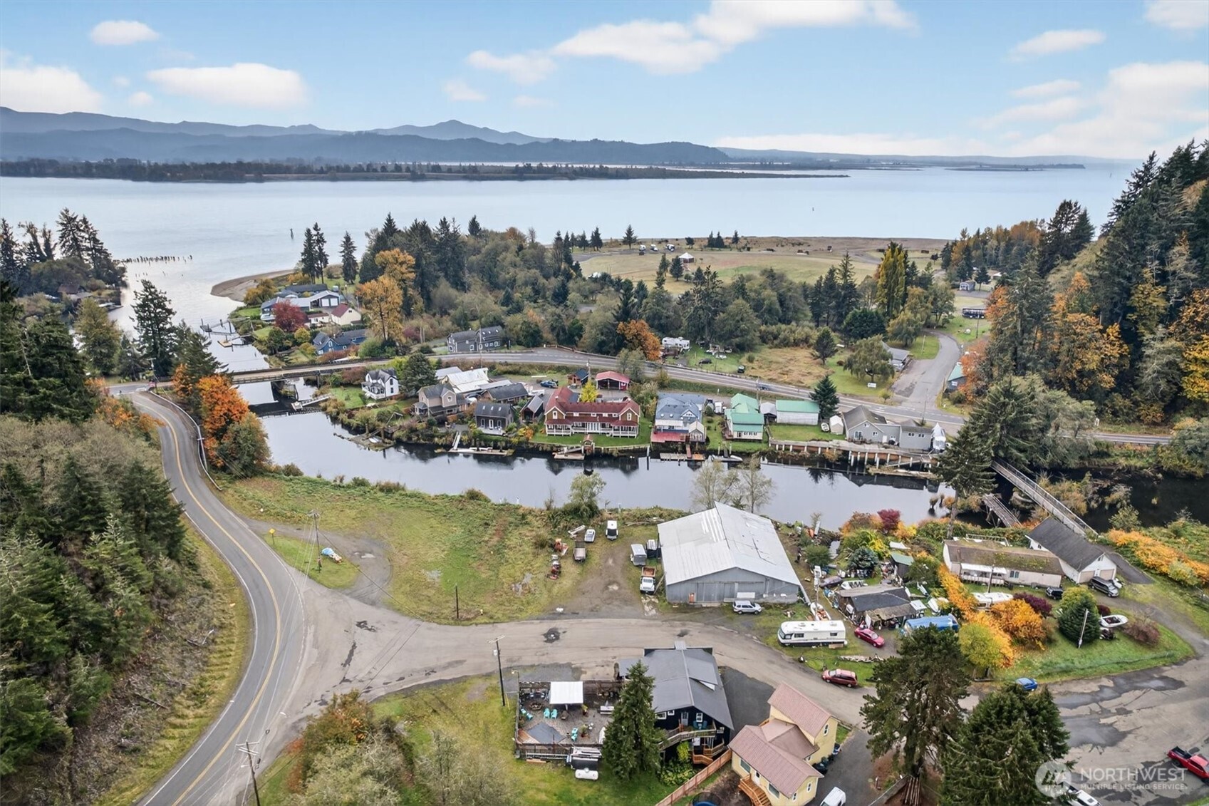 8 Fairgrounds Road Skamokawa, WA 98647 - Photo 40 of 40 a view of a lake with sitting area