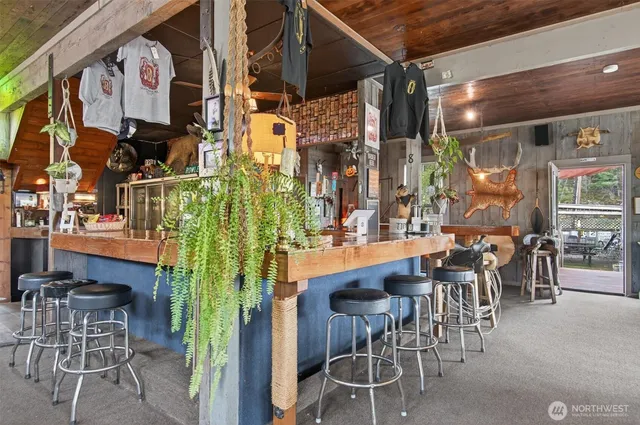 a view of an chairs and table in a patio