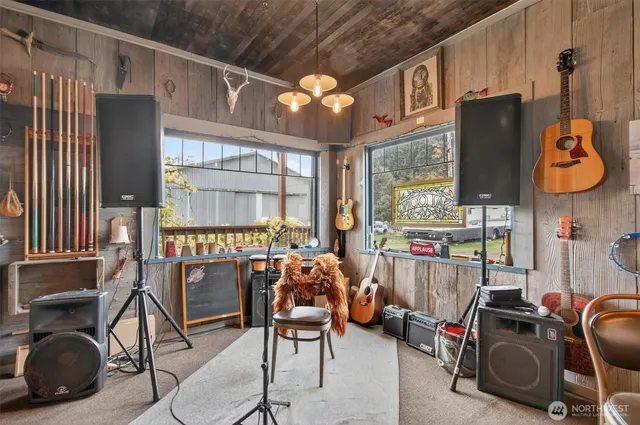 a view of gym equipment and windows