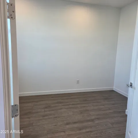 a view of an empty walk in closet