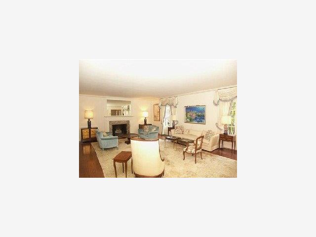 259 Bridge Road Hillsborough, CA 94010 - Photo 3 of 9 a living room with furniture and a table