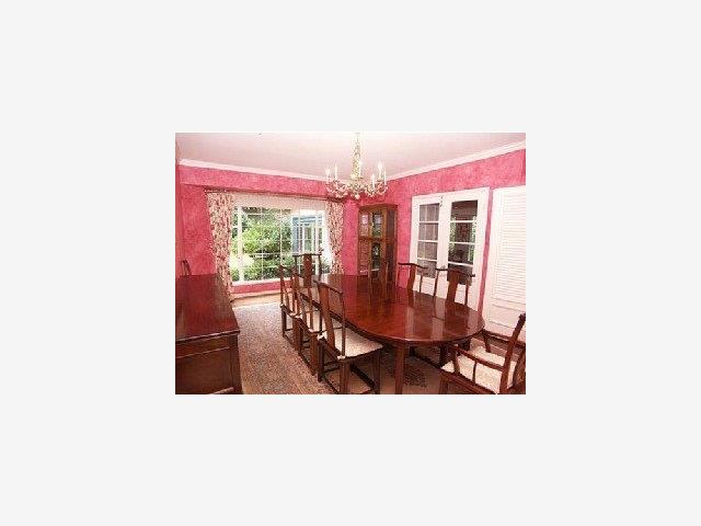 259 Bridge Road Hillsborough, CA 94010 - Photo 4 of 9 a view of a dining room with furniture and chandelier