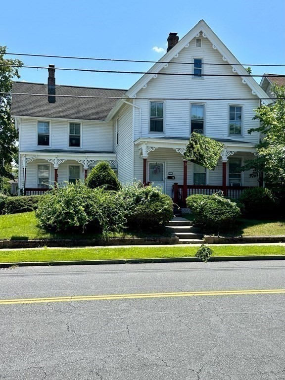 75 Parker Street Springfield, MA 01151 - Photo 7 of 28 a front view of a house with a yard