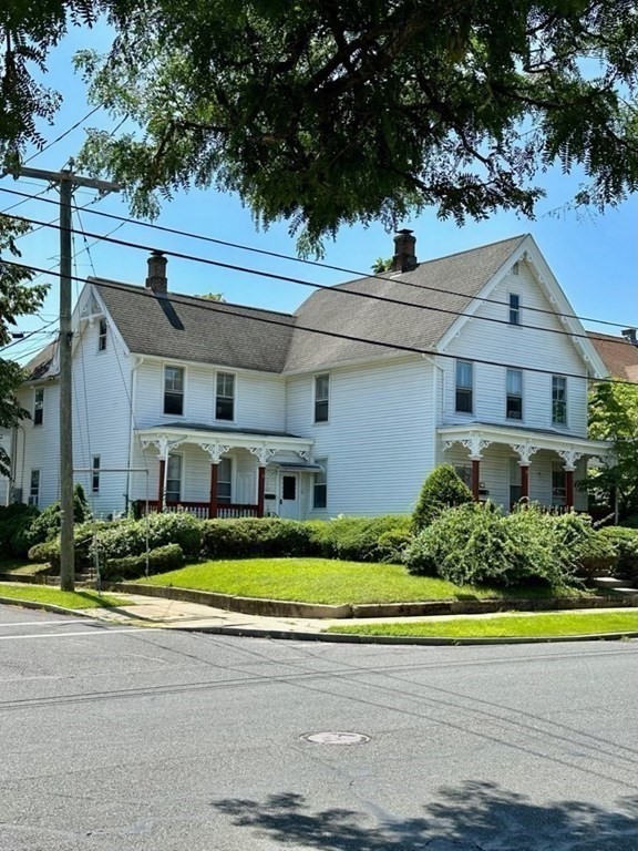 75 Parker Street Springfield, MA 01151 - Photo 8 of 28 a front view of a house with a yard