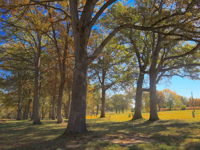 a view of a swimming pool with an outdoor space and seating area
