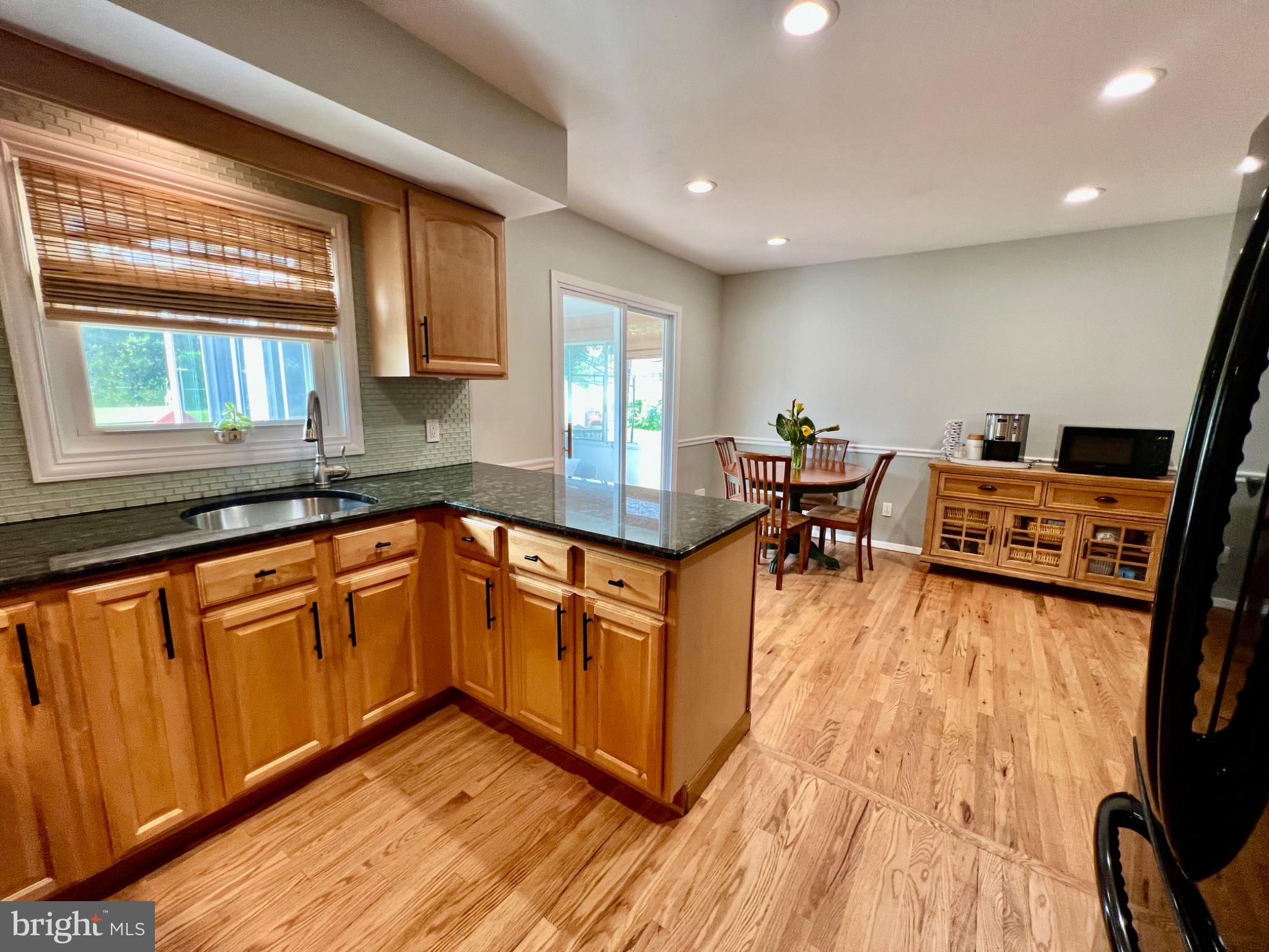 4 Running Brook Road Ewing, NJ 08638 - Photo 10 of 46 Inviting kitchen with warm wood tones.