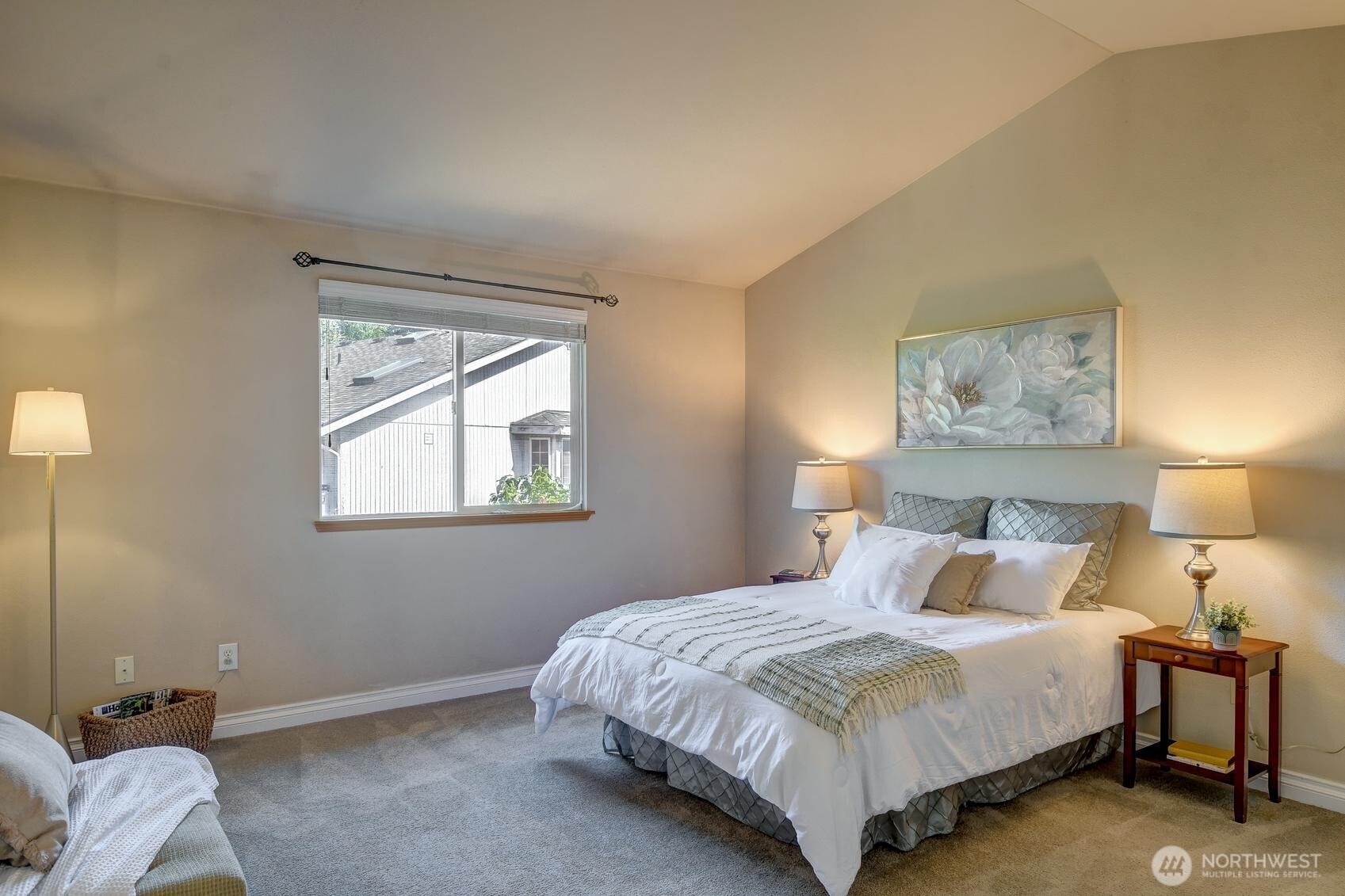 18524 114th Avenue Southeast Renton, WA 98055 - Photo 15 of 20 a bedroom with a bed and lamp