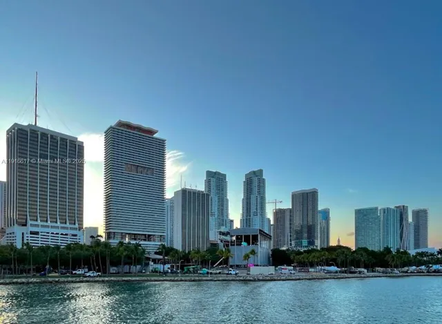 a view of a city with tall buildings
